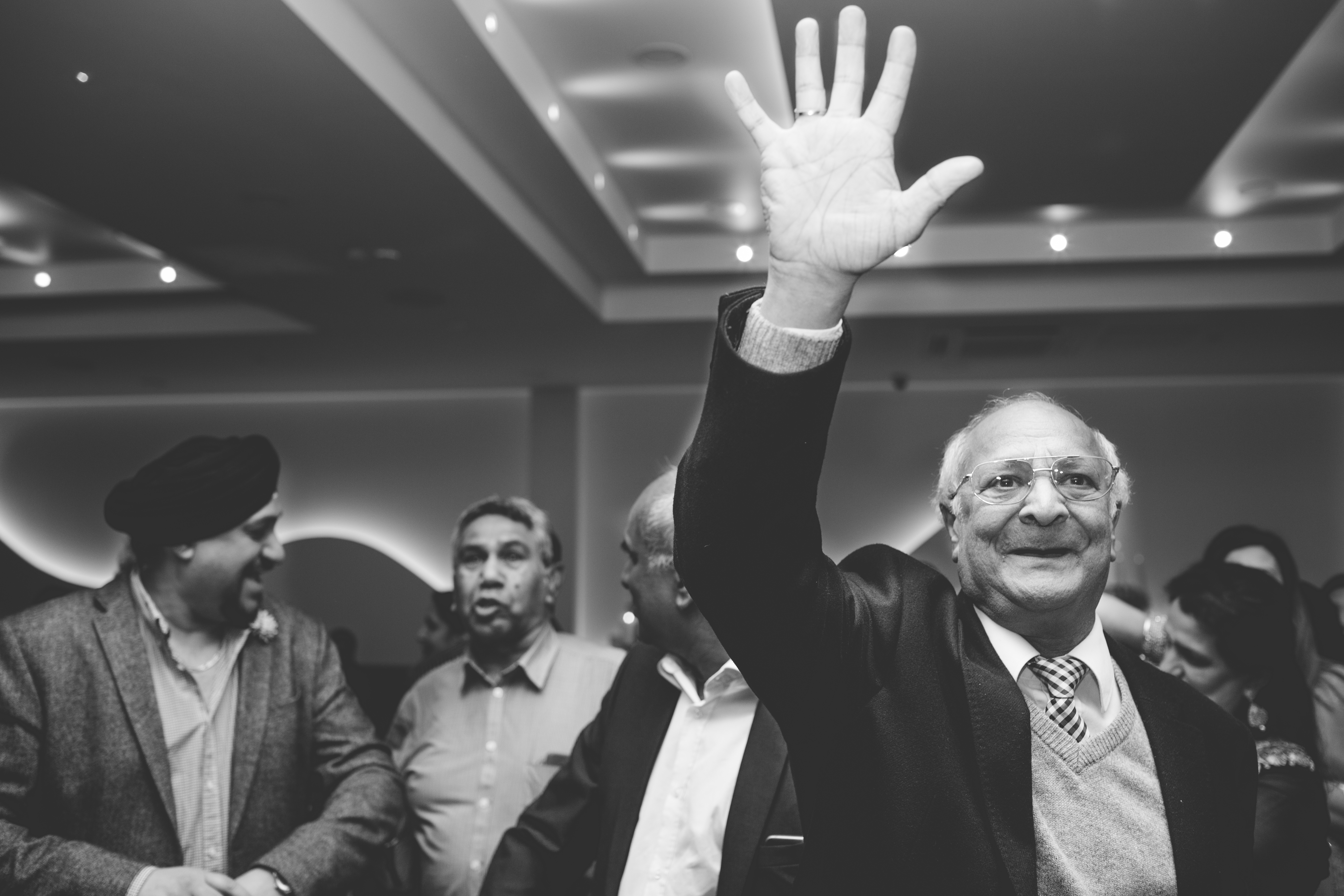 black and white photo of wedding guest