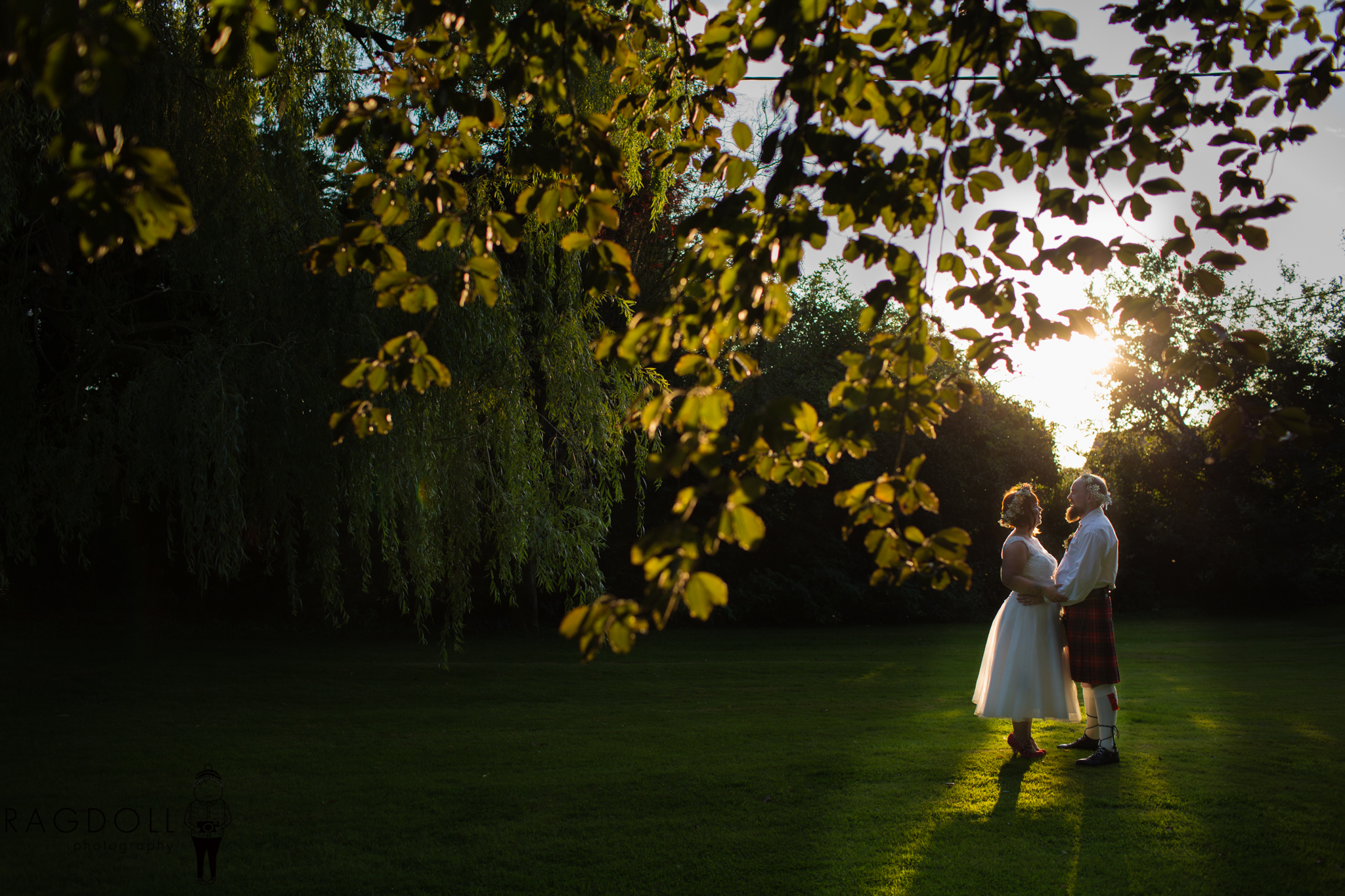 photo of newly married couple in golden light