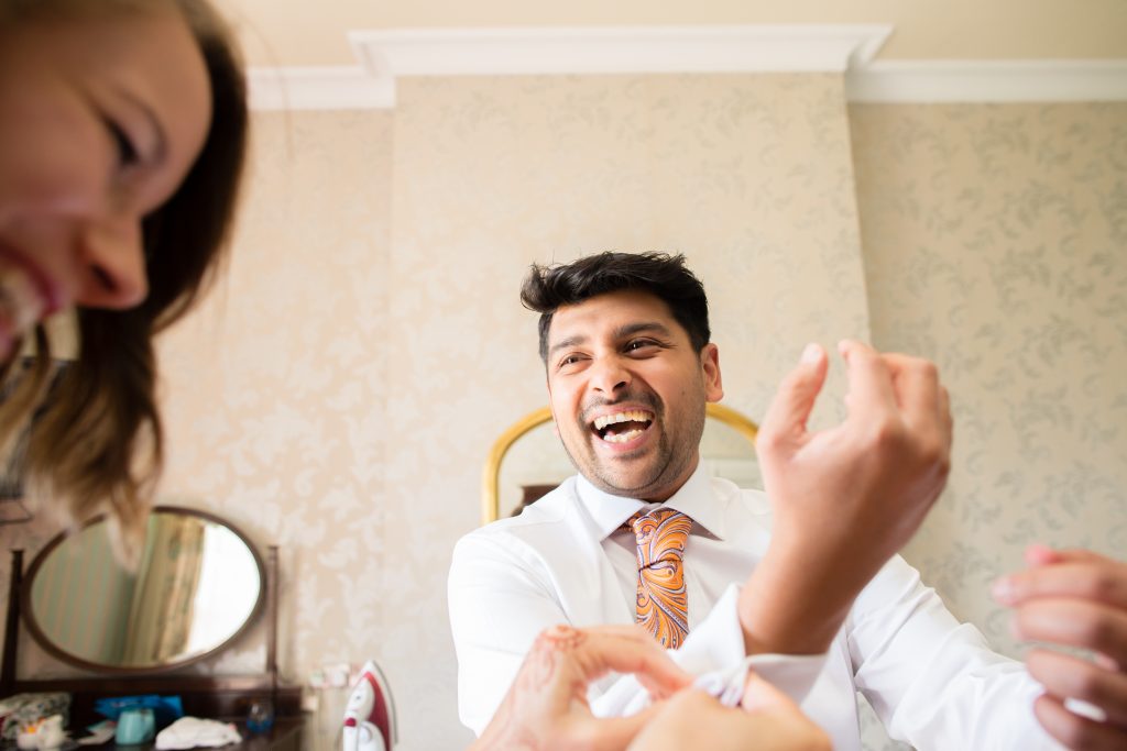 groom getting ready for wedding