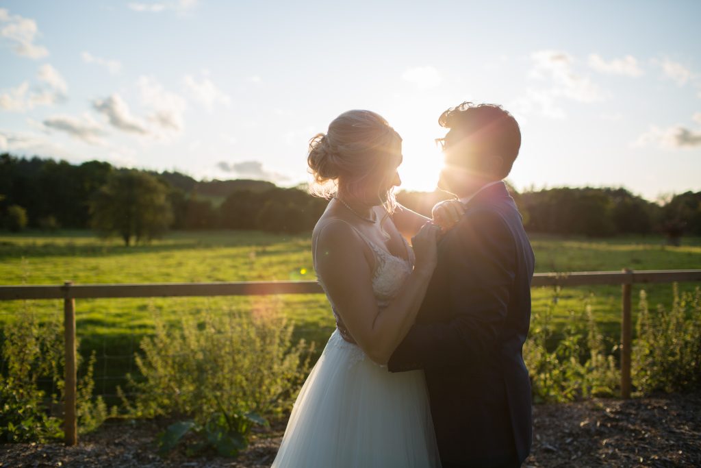 newly weds at golden hour