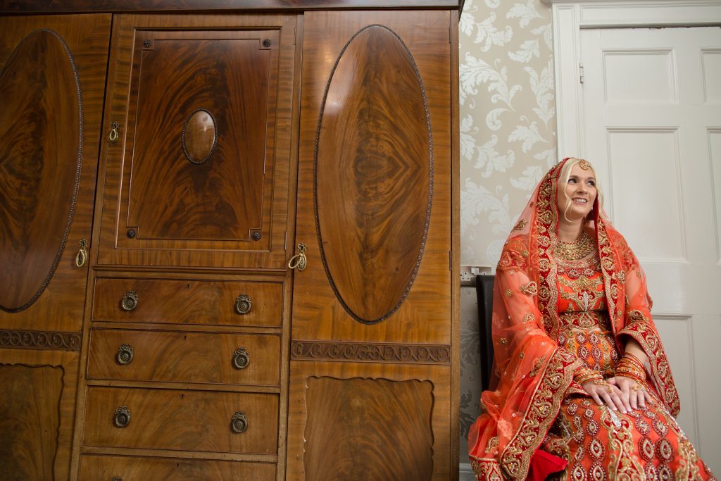 bride sat waiting in room at the sweeney hotel