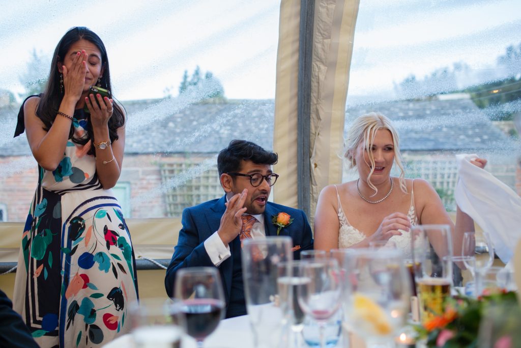 sister of groom doing wedding speech